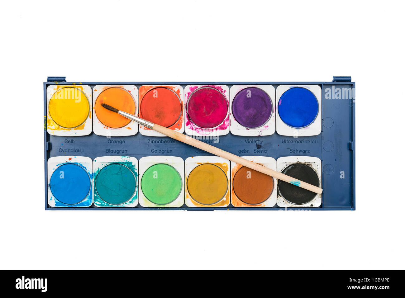 Watercolour paints.  Palette of various shades of watercolour paint and brush isolated on white background Stock Photo