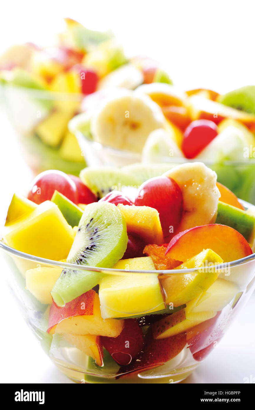 Fruit salad kiwis, grapes, bananas, apples, mango and peaches Stock