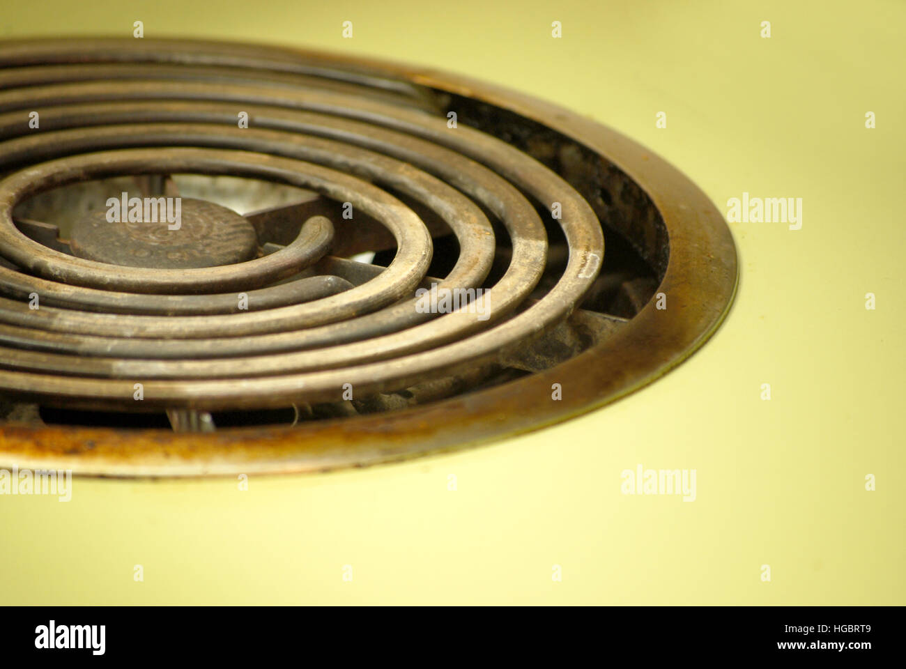 Old Fashioned Puke Green Stove Top Burner Coils Stock Photo