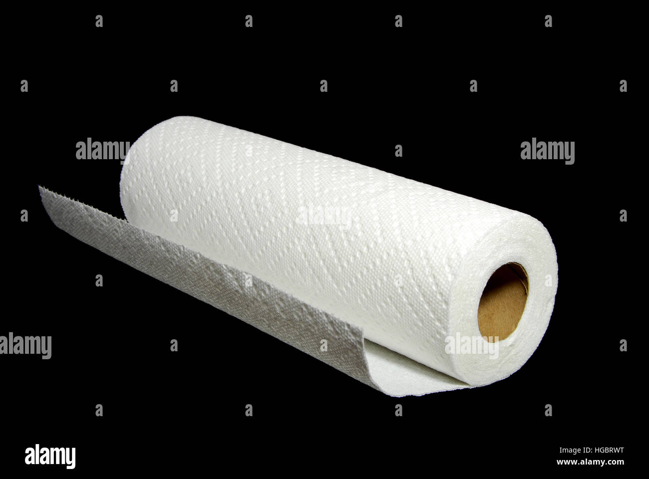 Paper towel roll isolated on a black background. Stock Photo