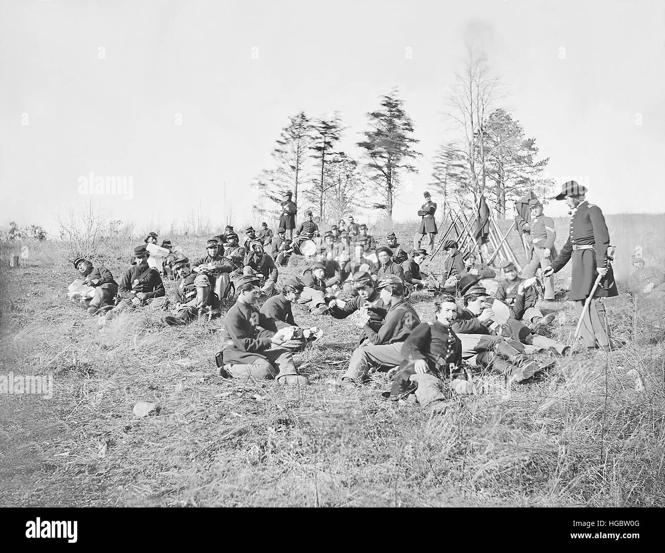 Infantry resting from drills during the American Civil War. Stock Photo