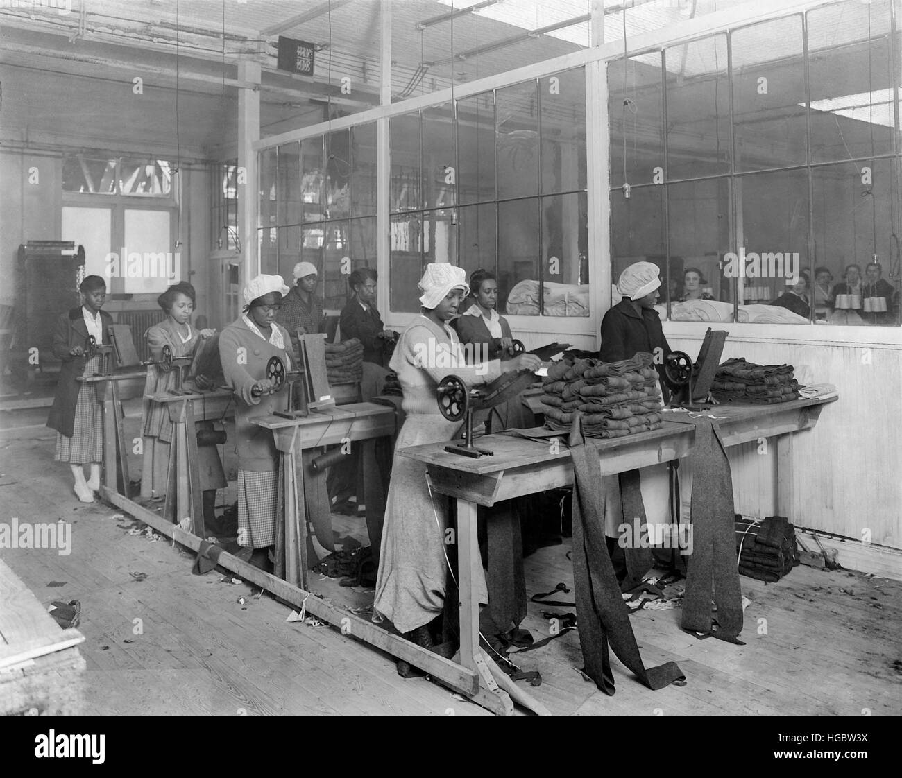 African-American women manufacturing spiral puttees, 1918. Stock Photo