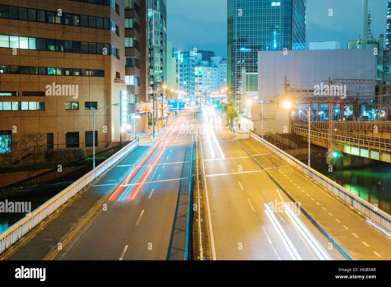 Downtown Osaka at night with light trails Stock Photo - Alamy
