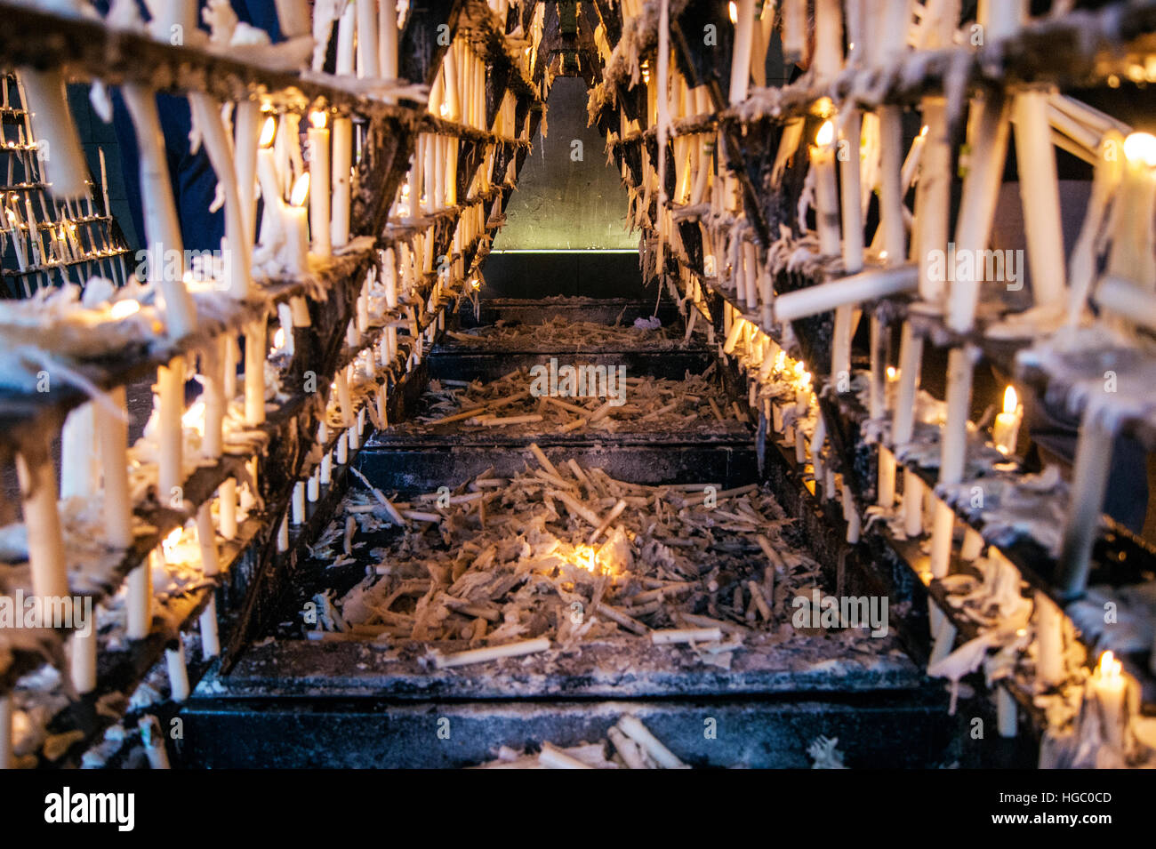 Offerings of candles in the pilgrimage of Rocio. Lighted candles on the