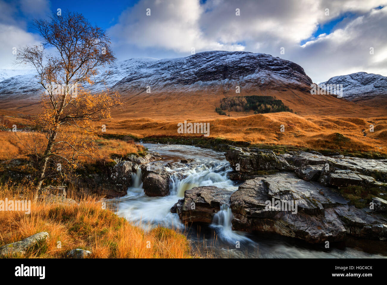 Waterfall in Glen Etive in the Scottish Highlands captured in early November. Stock Photo