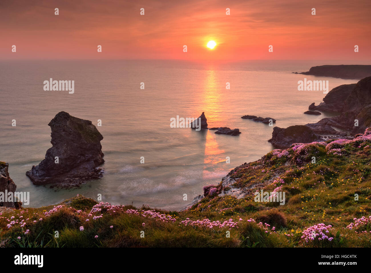 Sunset at Bedruthan Steps in Cornwall. Stock Photo