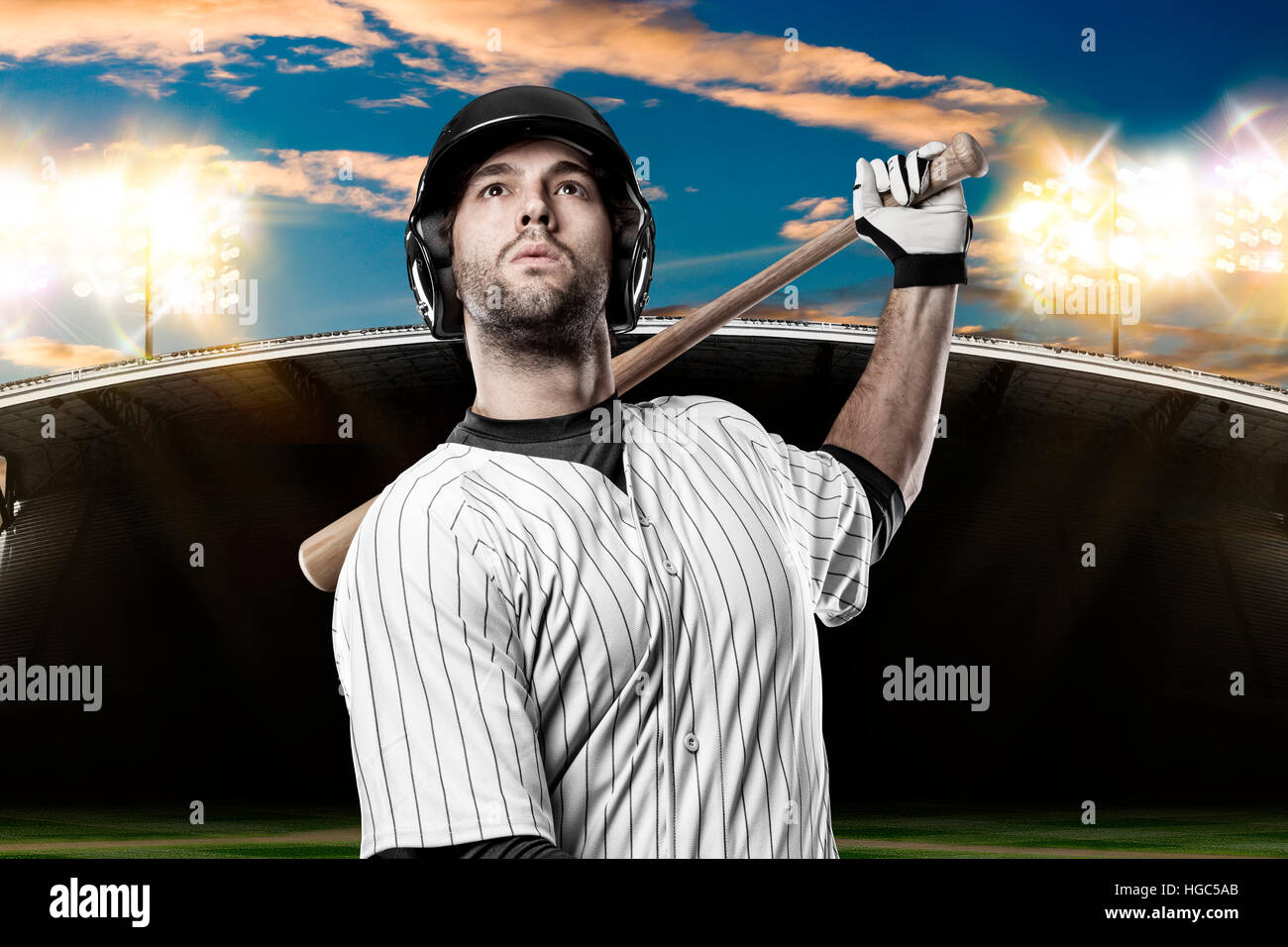 Baseball Player With A White Uniform On Baseball Stadium Stock Photo ...