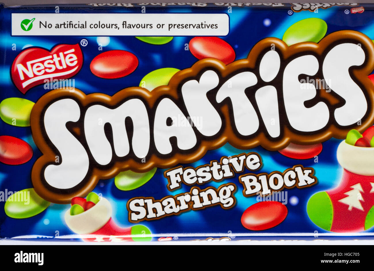 no artificial colours flavours or preservatives - detail on bar of Nestle Smarties Festive Sharing Block of chocolate Stock Photo
