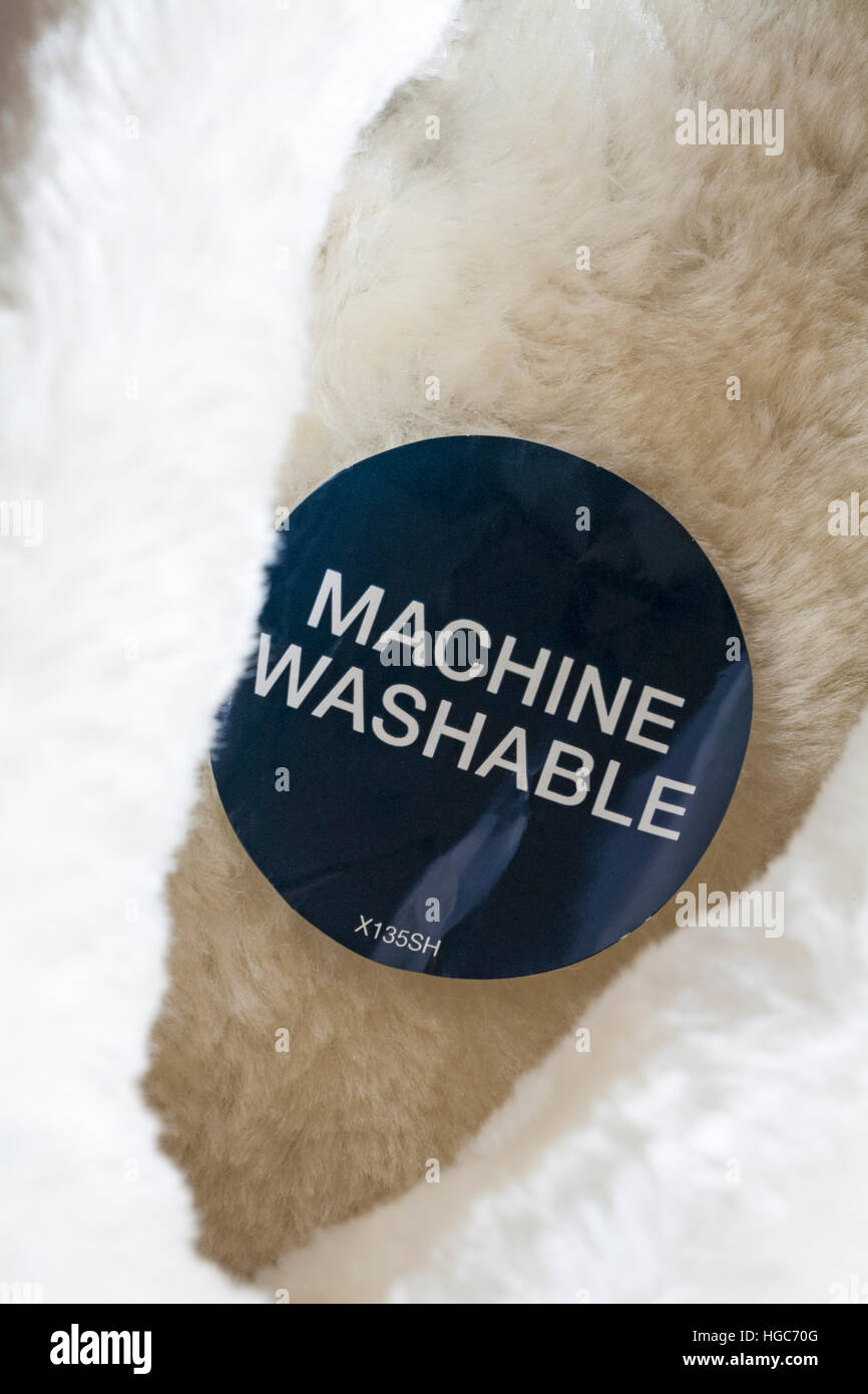 machine washable label sticker sticky in pair of slippers Stock Photo