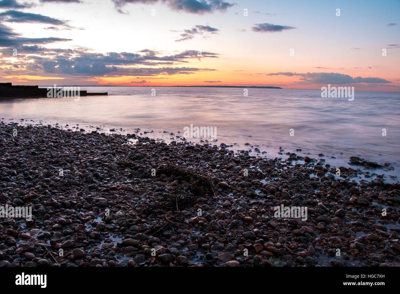 Sunset Over the Water Stock Photo - Alamy