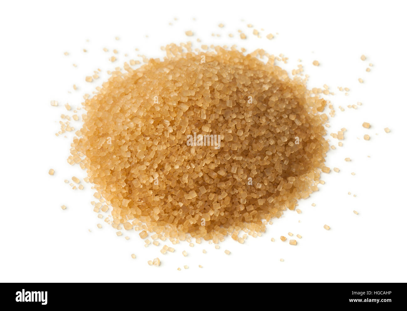 Heap of natural brown sugar isolated on white background Stock Photo