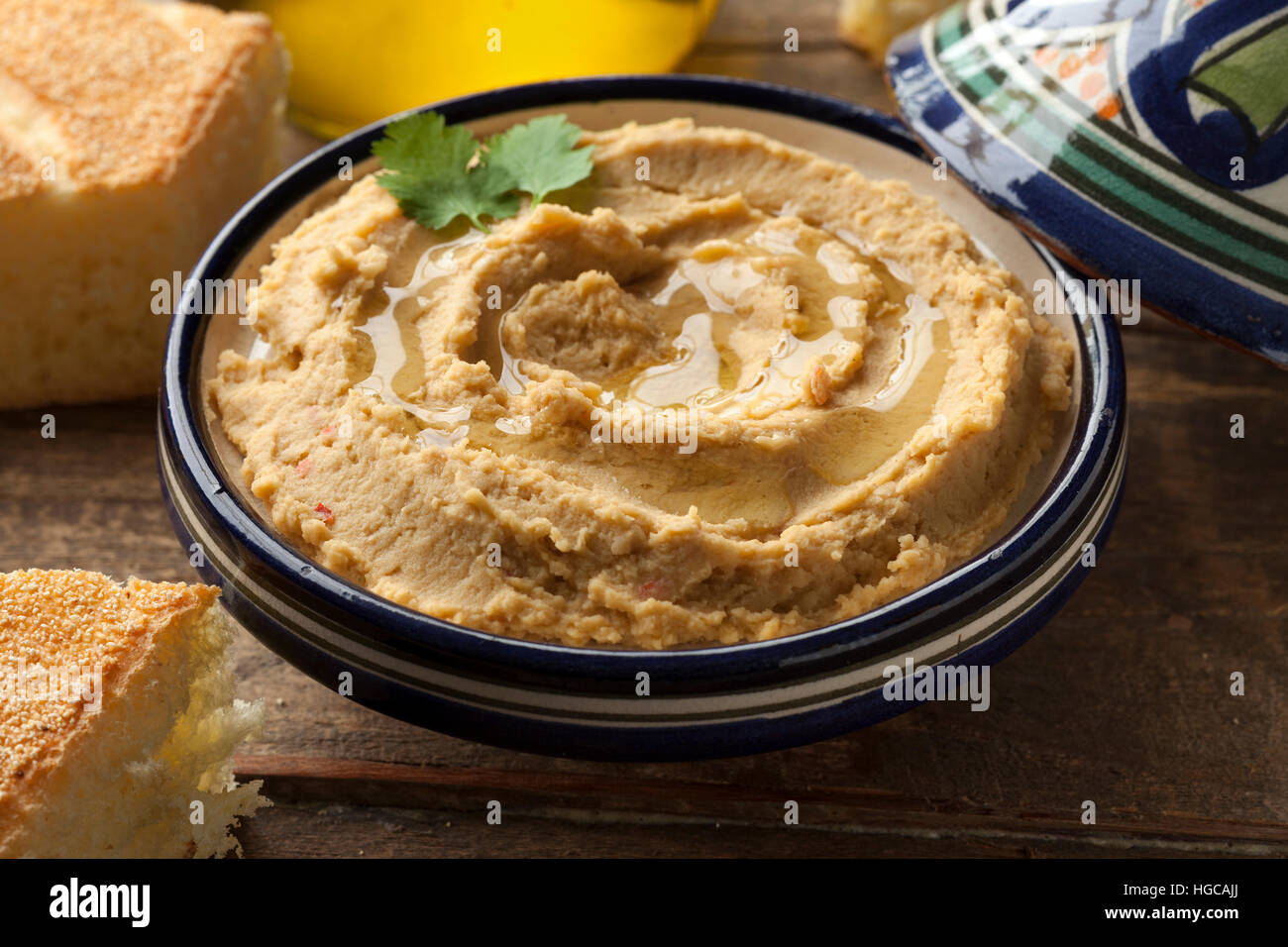 Bowl with Moroccan hummus and olive oil Stock Photo