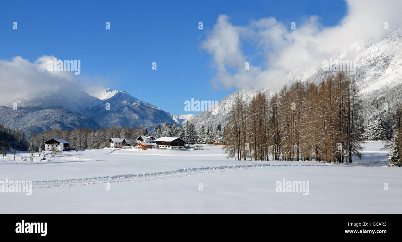 Winter Landscape with village on Sonnenplateau in Tyrol, Austria Stock Photo
