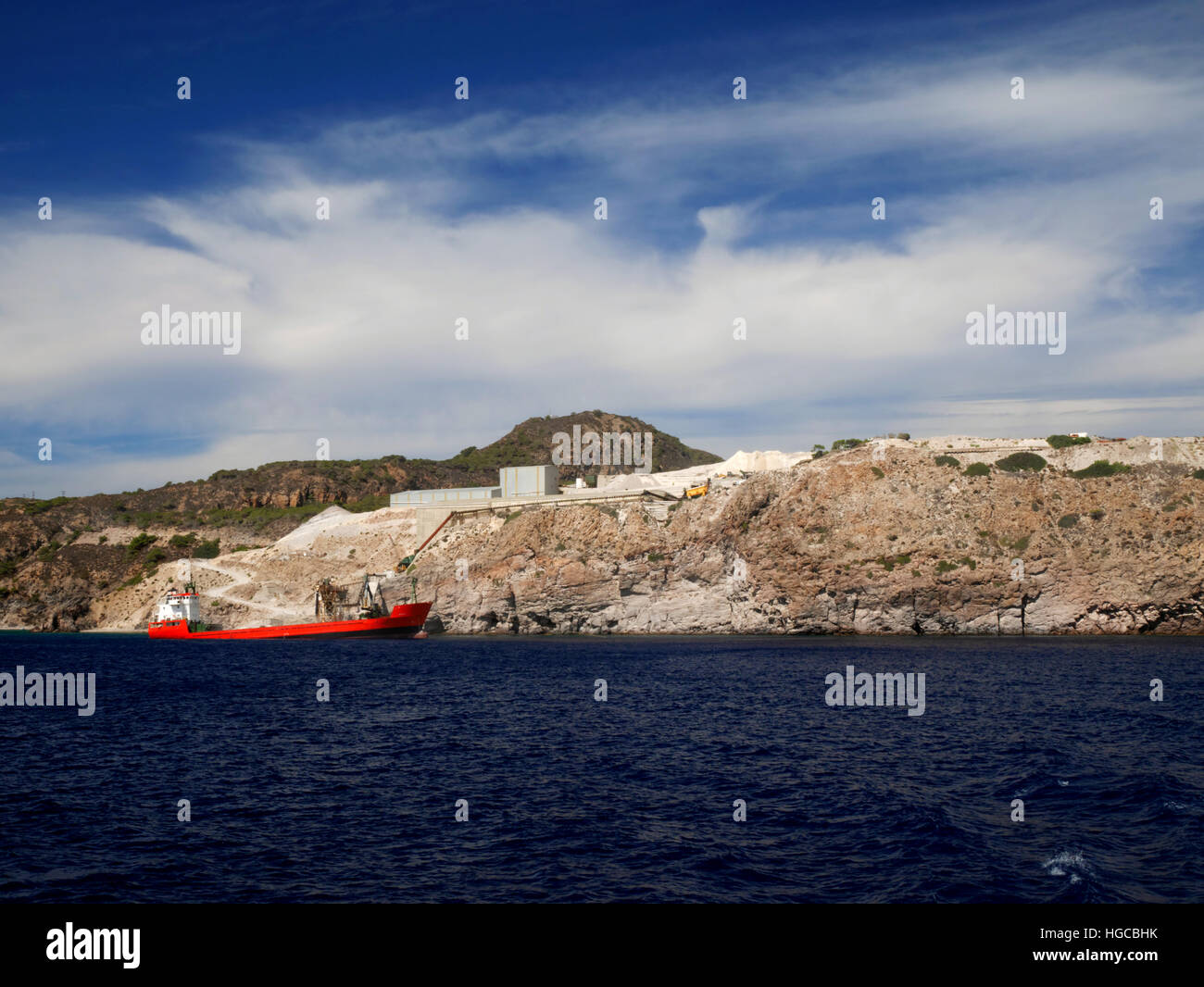 Perlite mines, Gyali, Nisyros, Greece.   Ship being loaded by conveyor. Stock Photo