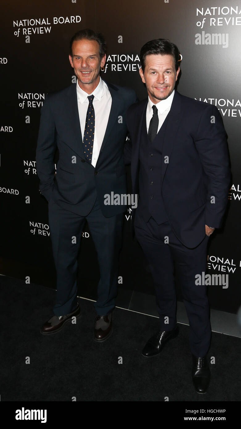 Director Peter Berg (L) and Mark Wahlberg attend the National Board of Review at Cipriani's in New York on January 4, 2017. Stock Photo