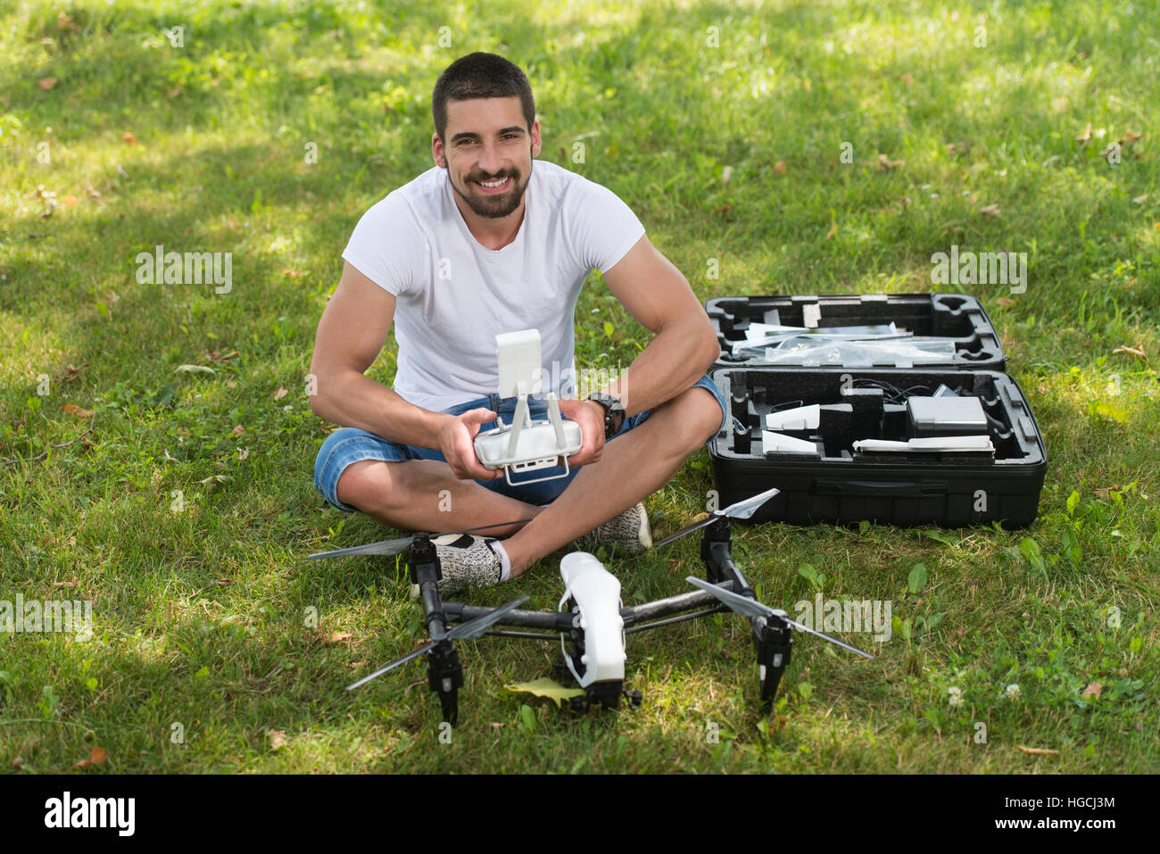 Young Engineer Man Prepares a Drone to Flight in Park Stock Photo - Alamy