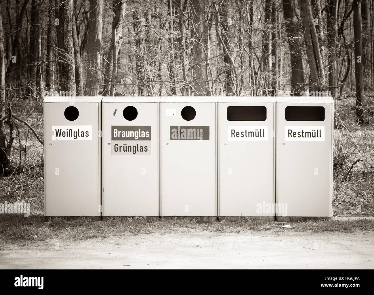 Recycle bins in nature Stock Photo