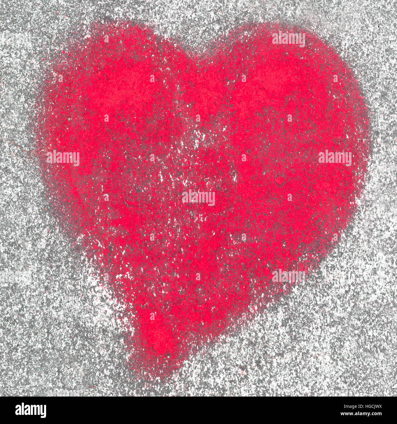 Red heart spray painted on a wall in the background Stock Photo Alamy