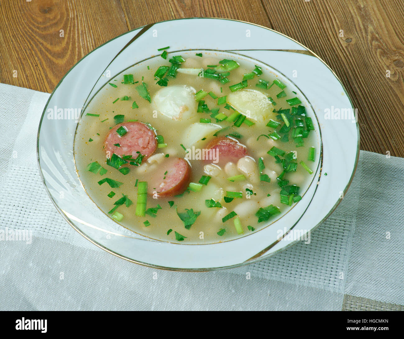 Slow Cooker Sausage, Spinach and White Bean Soup.close up Stock Photo