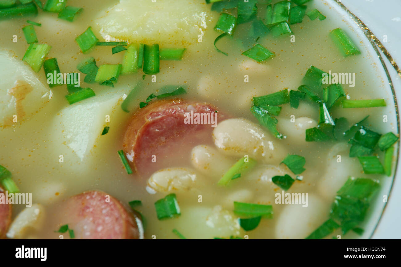 Slow Cooker Sausage, Spinach and White Bean Soup.close up Stock Photo