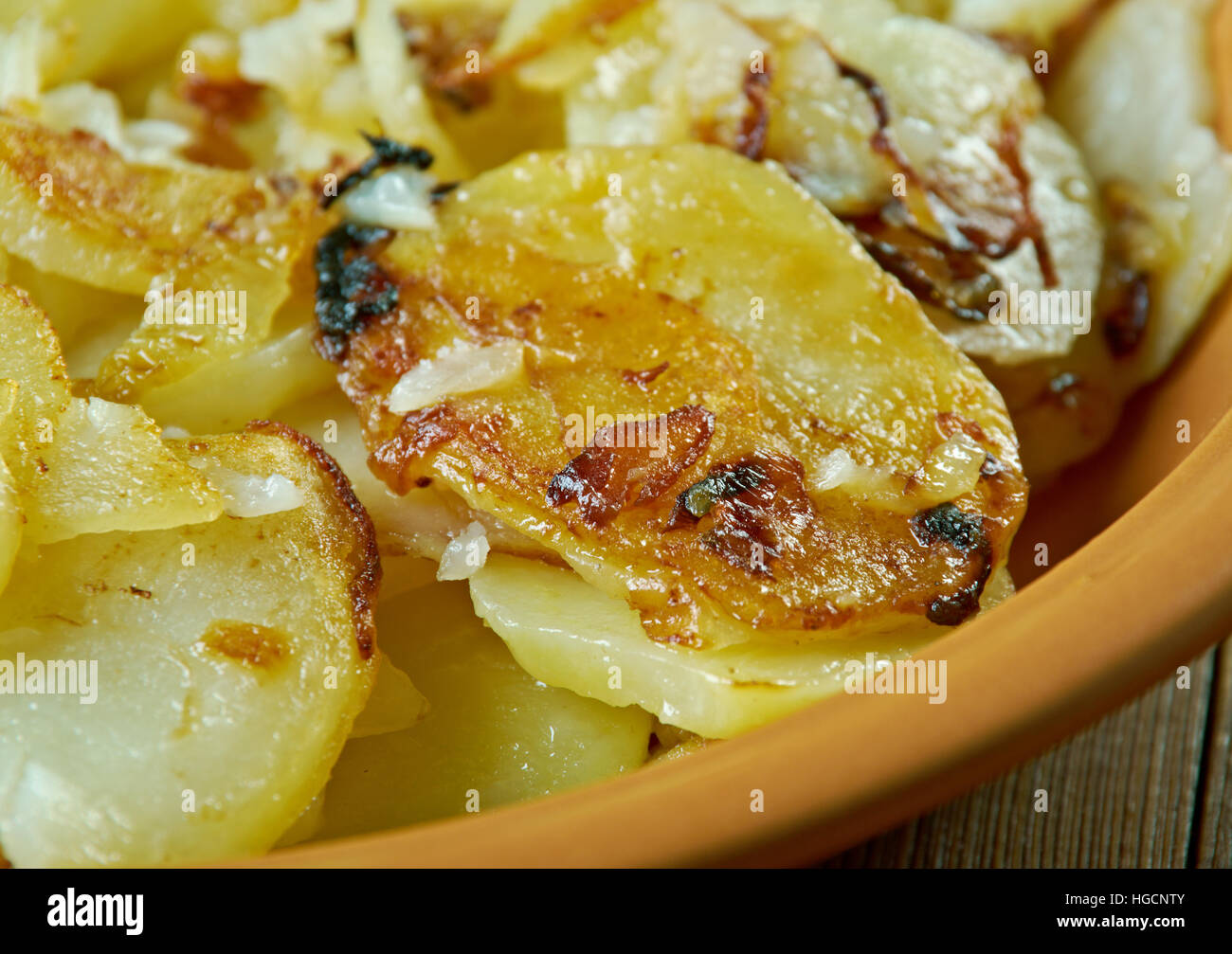 Lyonnaise potatoes French dish , fried potatoes with onion, parsley
