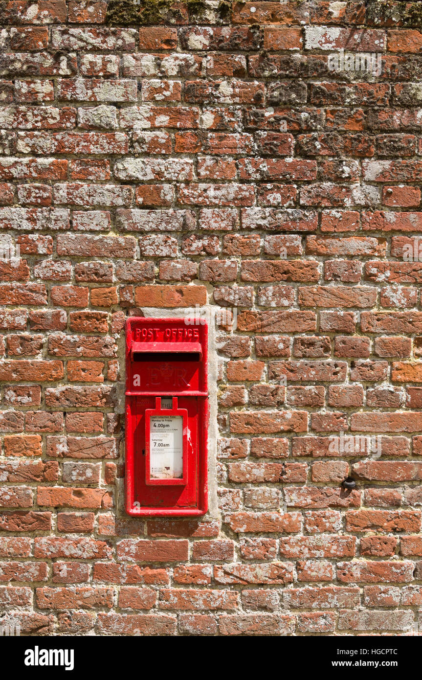 Postbox or mailbox in brick wall Stock Photo Alamy