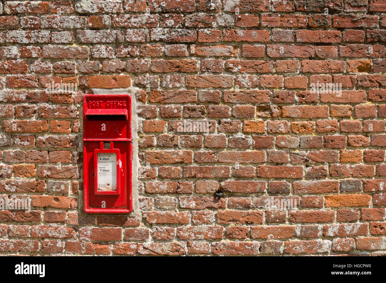 Postbox or mailbox in brick wall Stock Photo Alamy