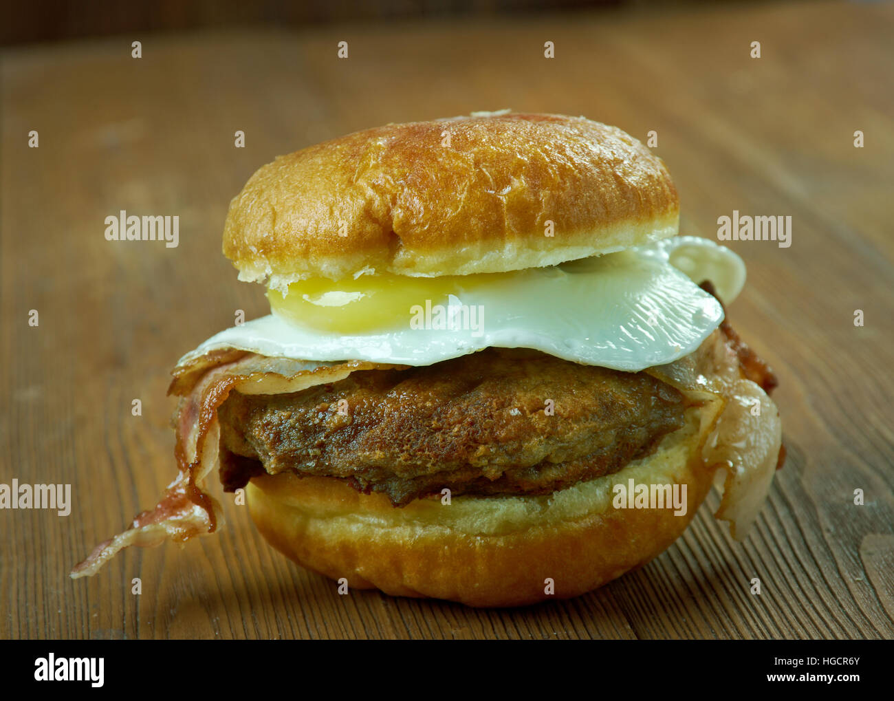 Luther Burger - hamburger or cheeseburger with one or more glazed doughnuts in place of the bun. Stock Photo