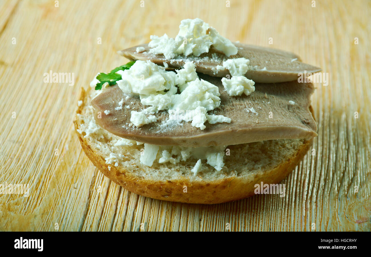 Tongue toast  open sandwich prepared with sauteed beef tongue Stock Photo