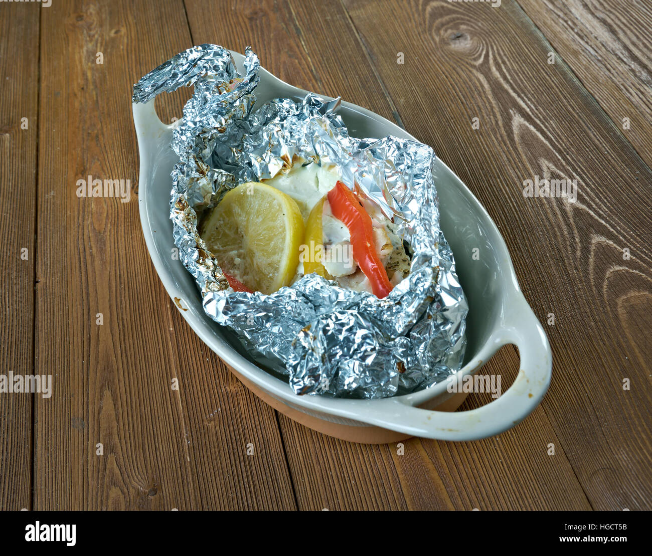 Homemade Jamaican coconut fish parcels.Caribbean cuisine Stock Photo