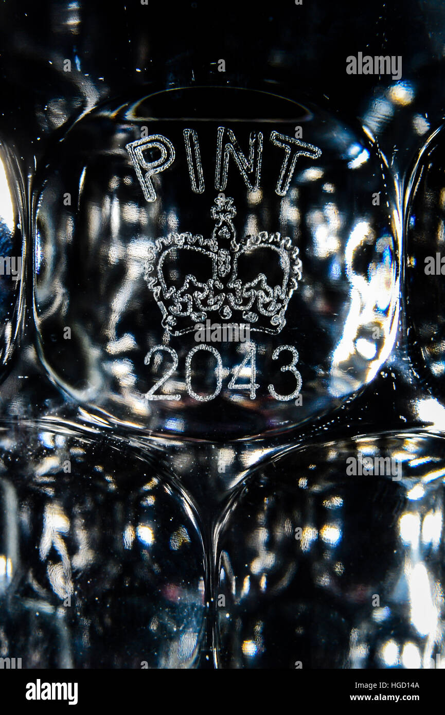 A dimpled pint glass etched with the Crown stamp rather than the European CE marking, as Ukip MEP Bill Etheridge has backed calls for the return of traditional Crown stamps on Britain's pint glasses - a decade after they began to disappear in favour of an EU-wide &Ograve;European Conformity&Oacute; mark. Stock Photo