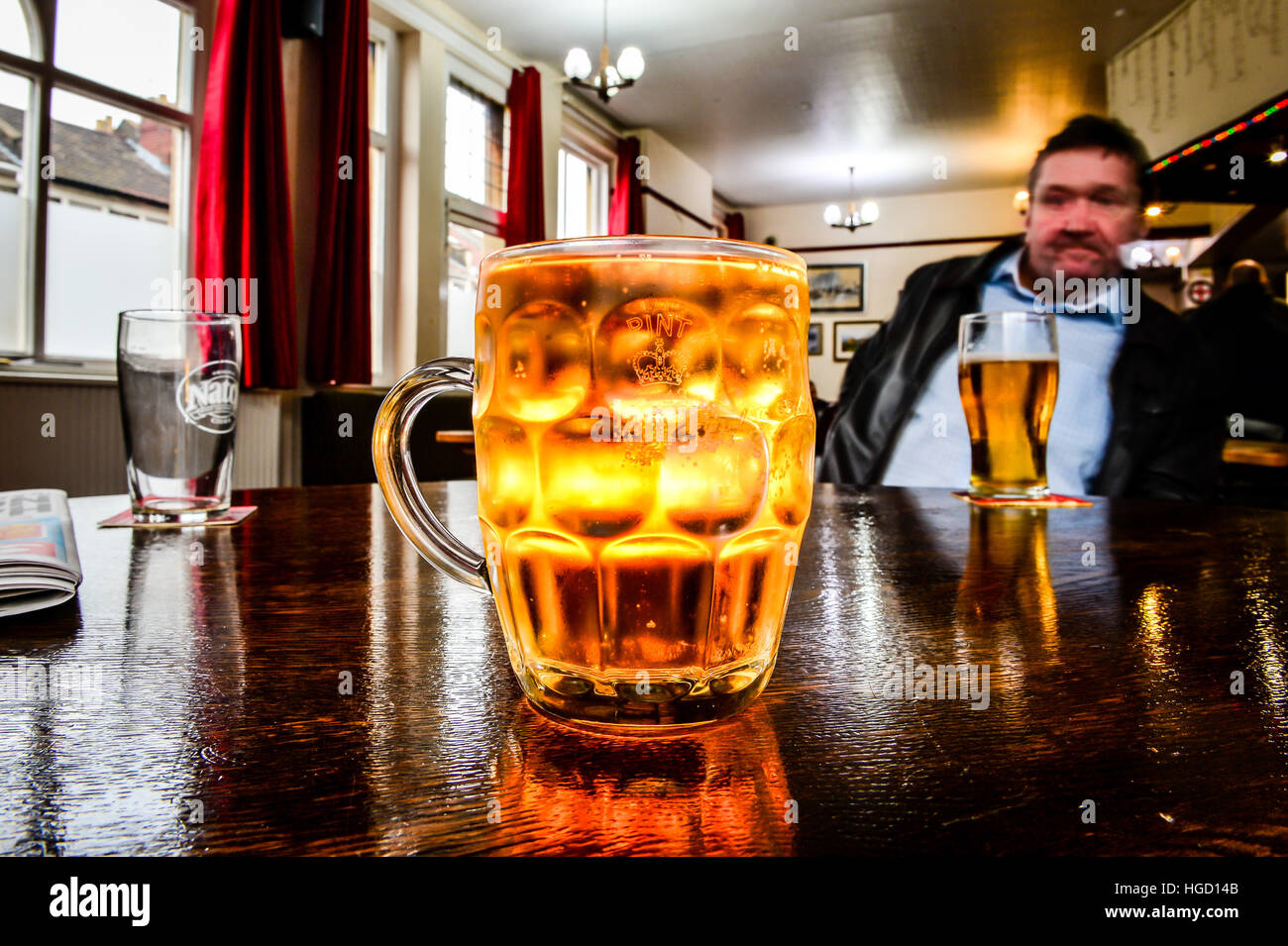 A dimpled pint glass etched with the Crown stamp rather than the European CE marking, as Ukip MEP Bill Etheridge has backed calls for the return of traditional Crown stamps on Britain&Otilde;s pint glasses - a decade after they began to disappear in favour of an EU-wide &Ograve;European Conformity&Oacute; mark. Stock Photo