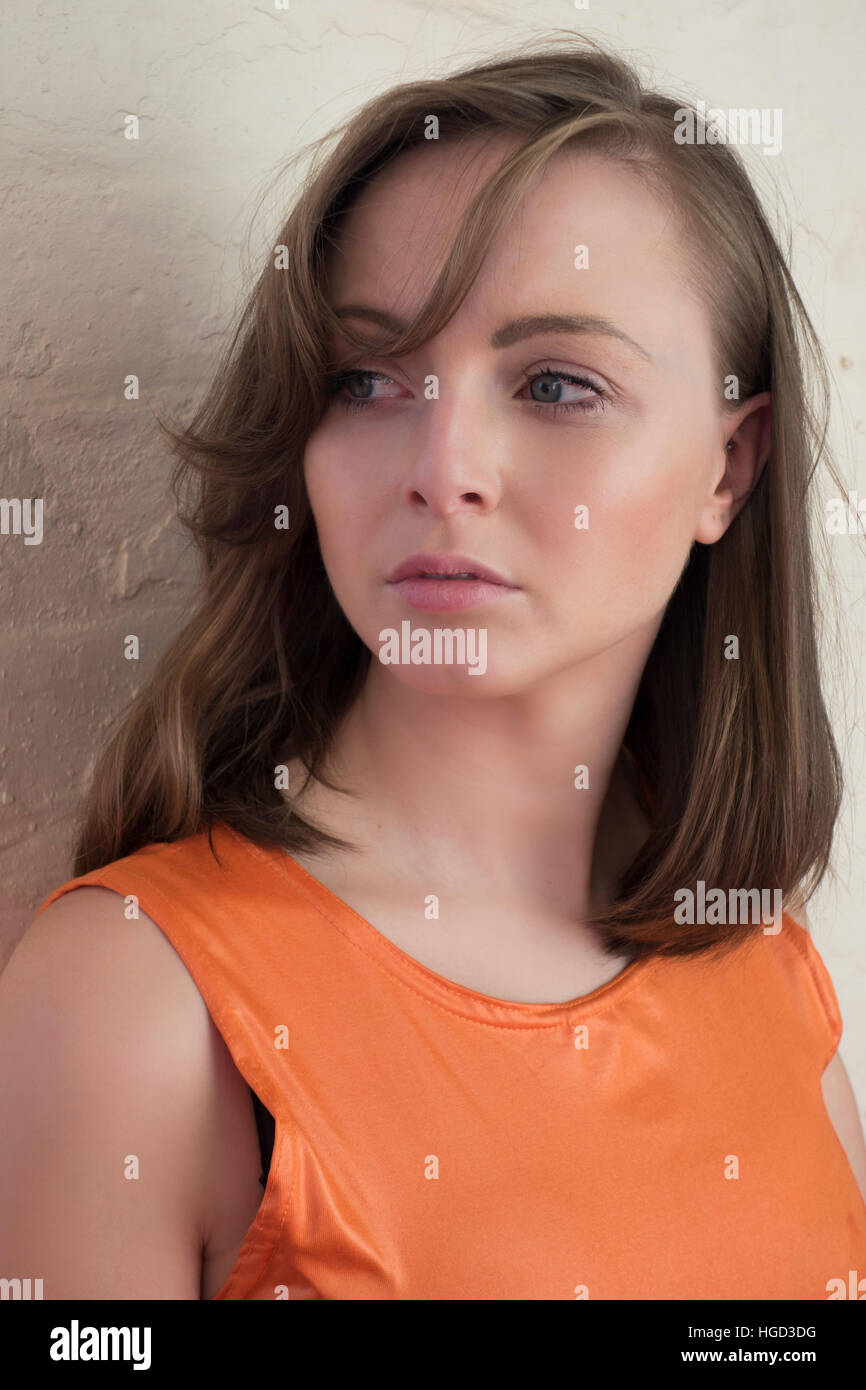 Serious woman looking away Stock Photo Alamy