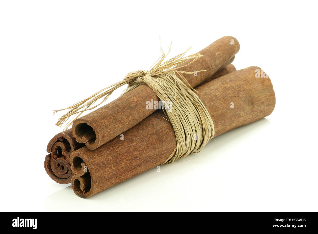 Three cinnamon sticks wrapped together Stock Photo Alamy