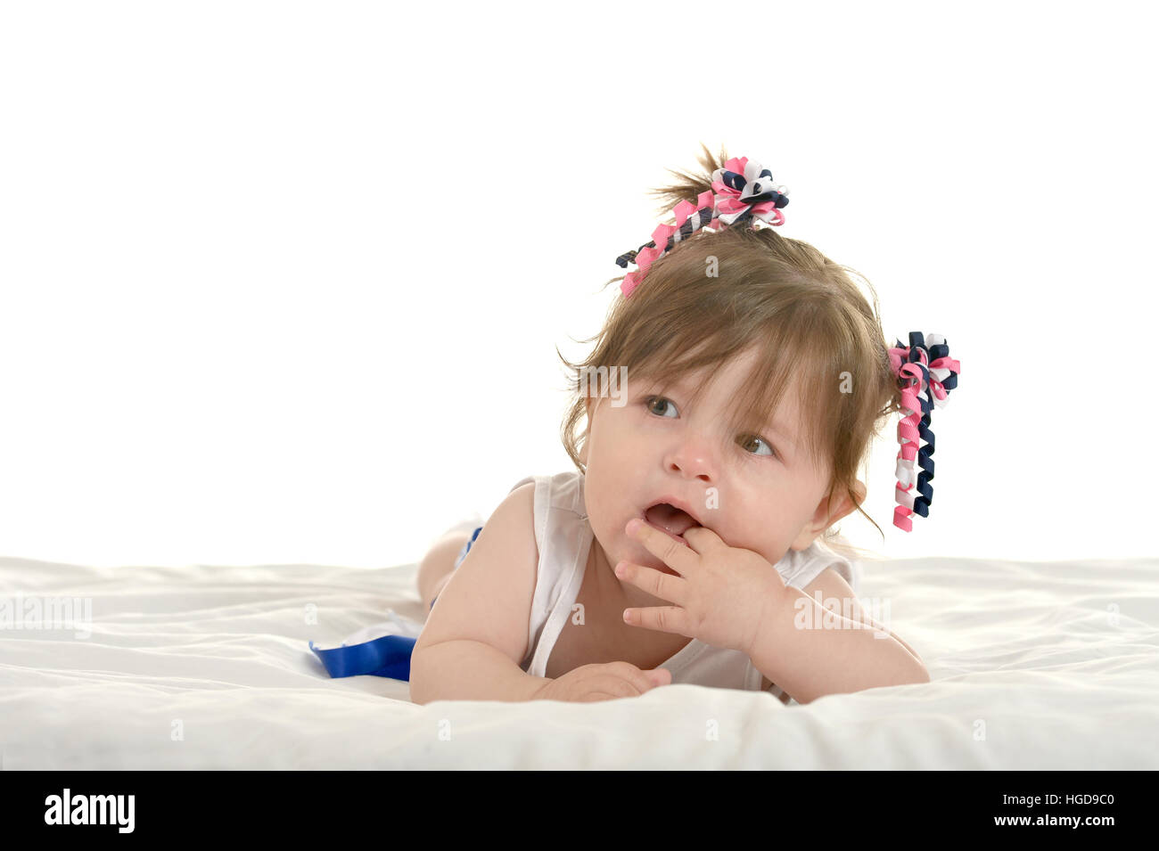 Baby girl lying on blanket Stock Photo Alamy
