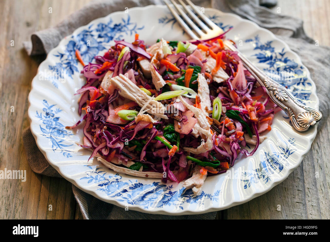 Salad with leftover turkey, red cabbage, apples and carrots Stock Photo