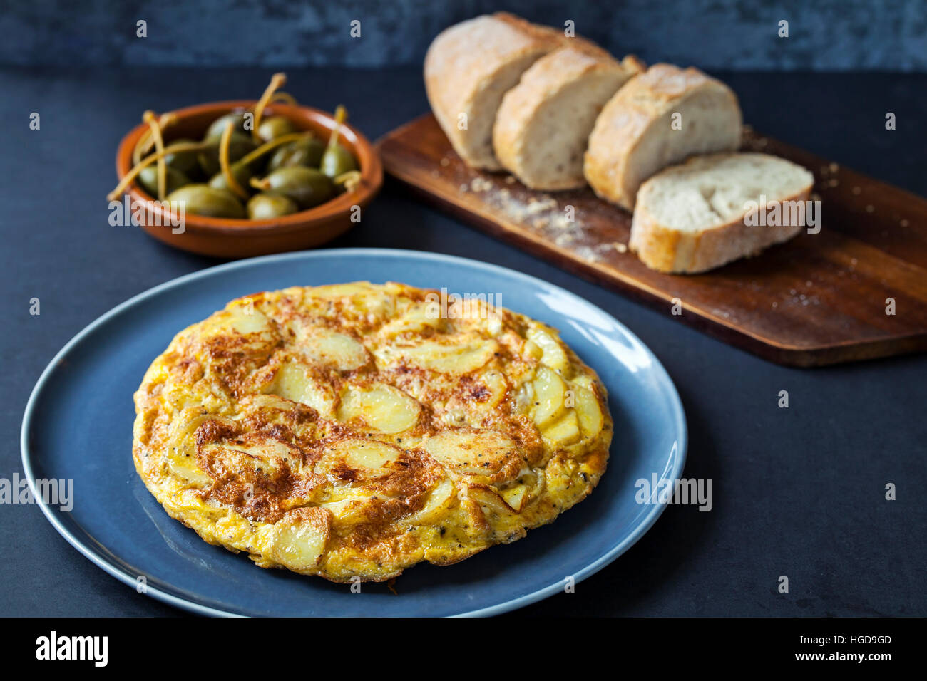 Authentic Spanish tapas with traditional tortilla and caperberries