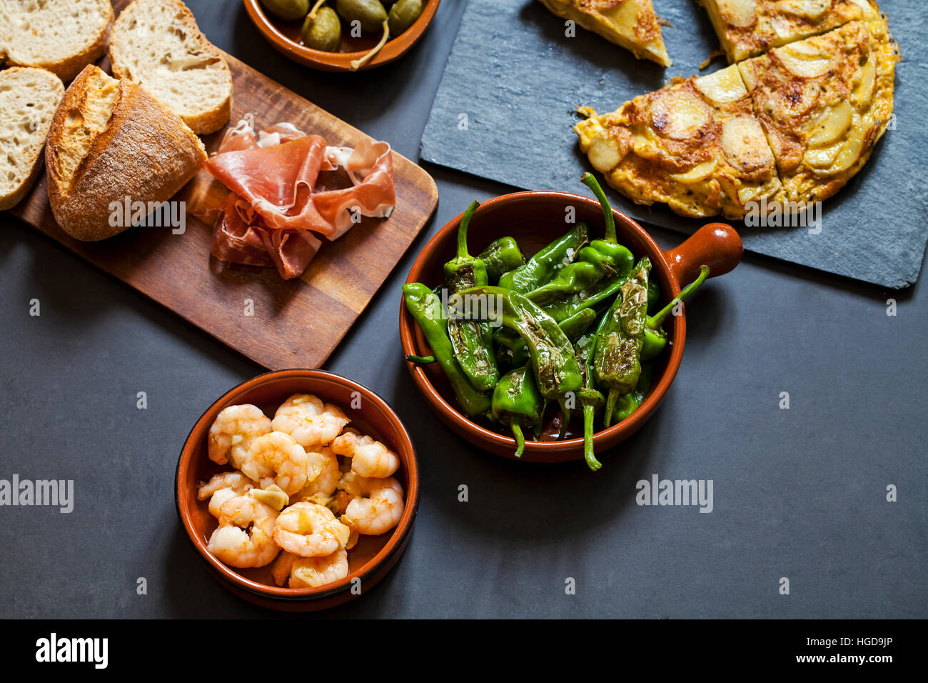 Authentic Spanish tapas with padron peppers, garlic prawns and