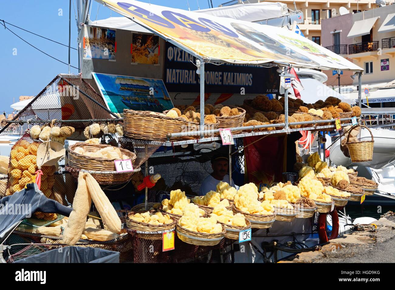 Natural sponges and gifts for sale on a boat in the harbour, Chania, Crete, Greece, Europe. Stock Photo