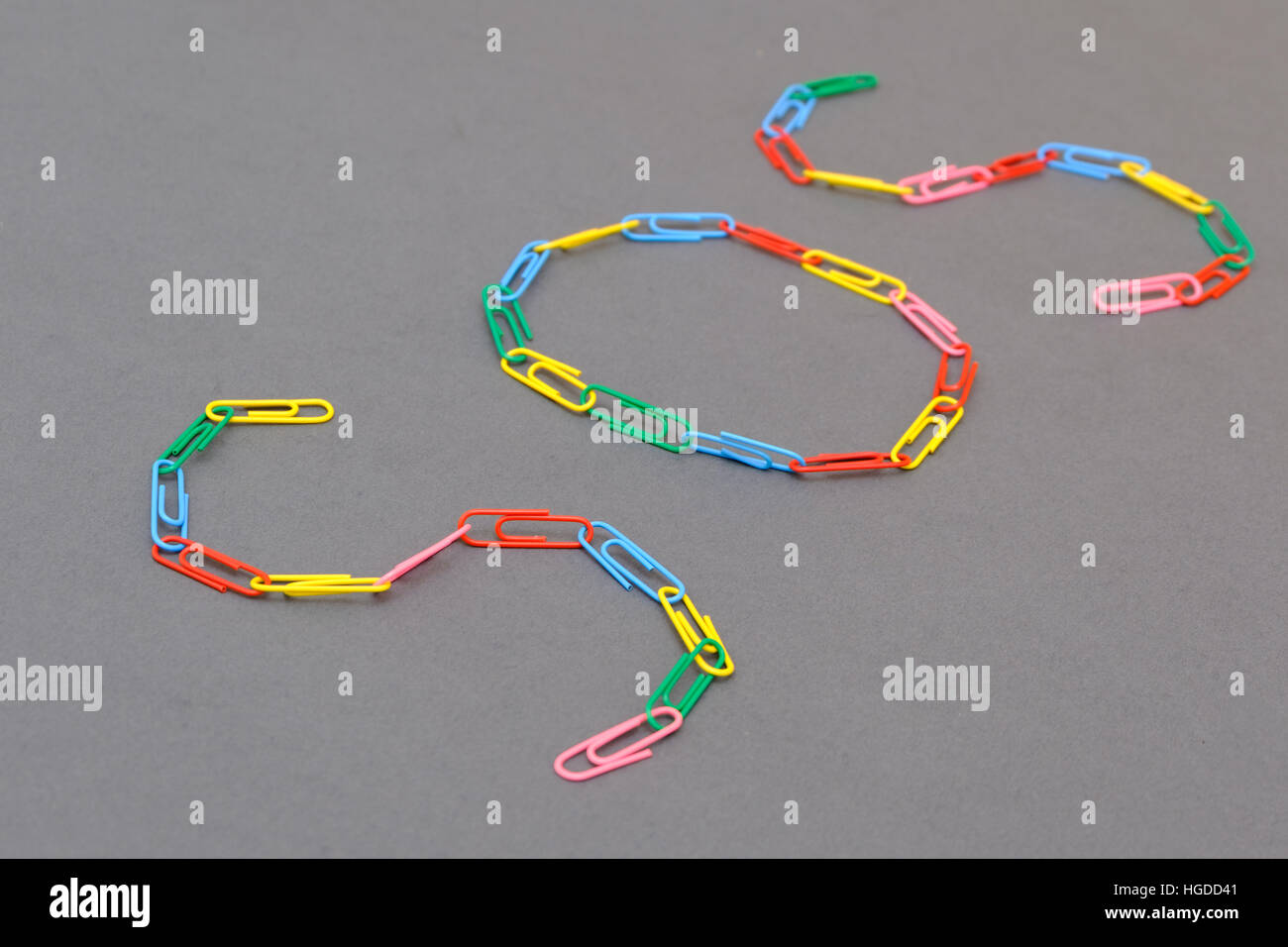 Sos word made of paper clips isolated Stock Photo