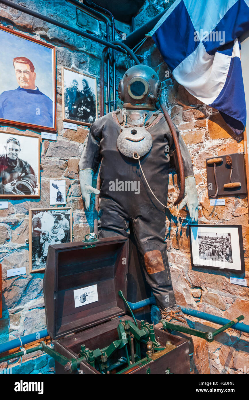United Kingdom, Channel Islands, Jersey, St. Helier, Maritime Museum, Exhibit of Vintage Deep Sea Diving Suit Stock Photo