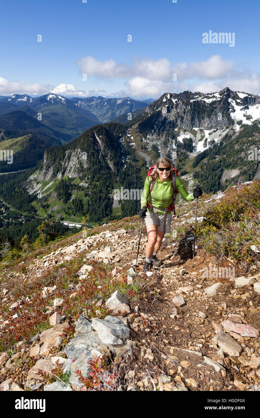 WA11907-00...WASHINGTON - Hiker on the Snoqualmie Mountain Trail in the Mount Baker-Snoqualmie National Forest. (MR# S1) Stock Photo