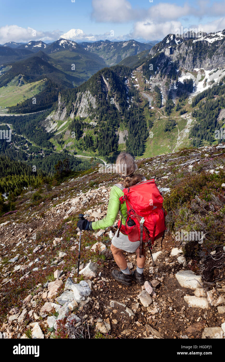 WA11912-00...WASHINGTON - Hiker on the Snoqualmie Mountain Trail in the Mount Baker-Snoqualmie National Forest. (MR# S1) Stock Photo