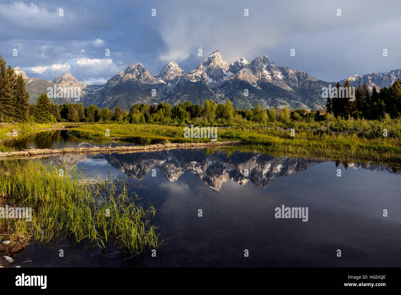 WY01995-00...WYOMING - The Teton Range reflected in the Snake River viewed from Schwabacher Landing in Grand Teton National Park. Stock Photo