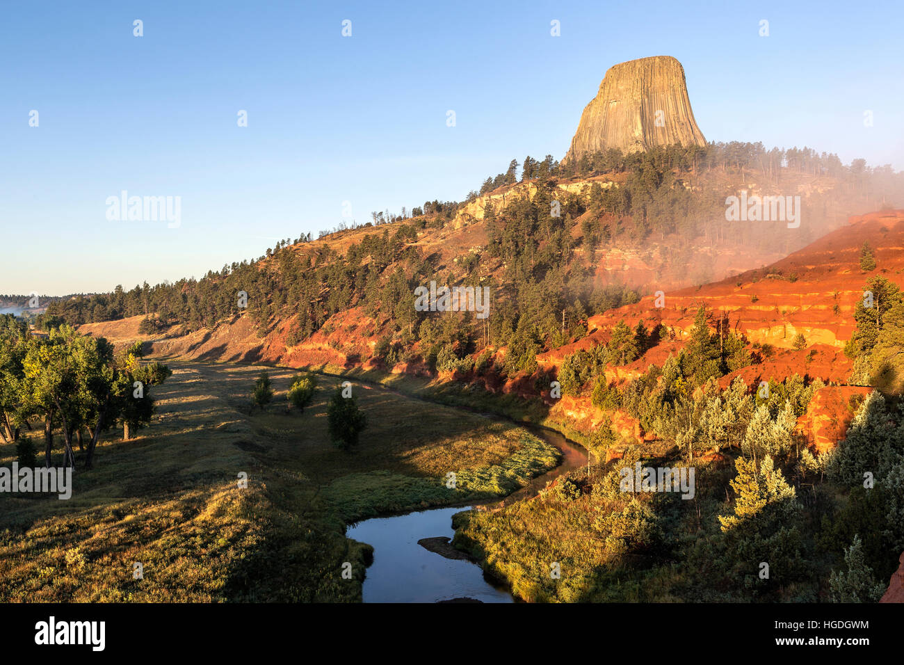 WY02261-00...WYOMING - Devils Tower with the Red Beds and Belle Fourche River in Devils Tower National Monument. Stock Photo