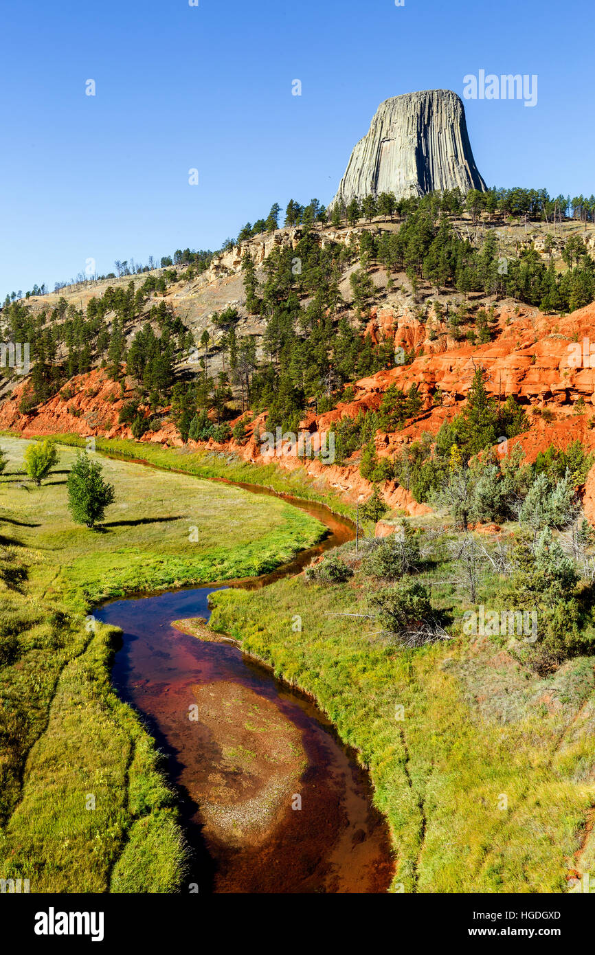 WY02265-00...WYOMING - Devils Tower with the Red Beds and Belle Fourche River in Devils Tower National Monument. Stock Photo