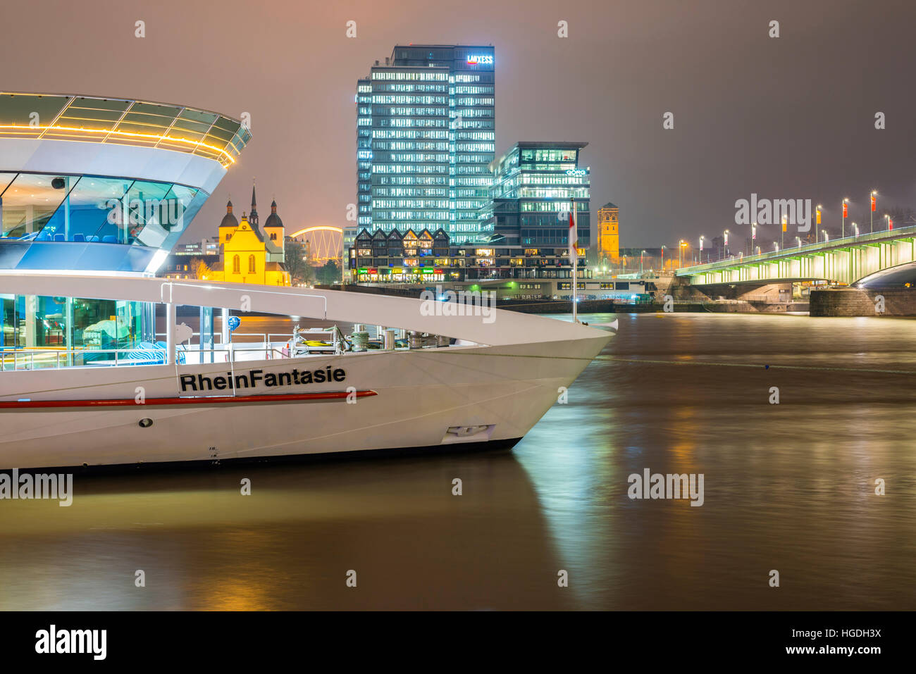 tour boat in Cologne by night Stock Photo
