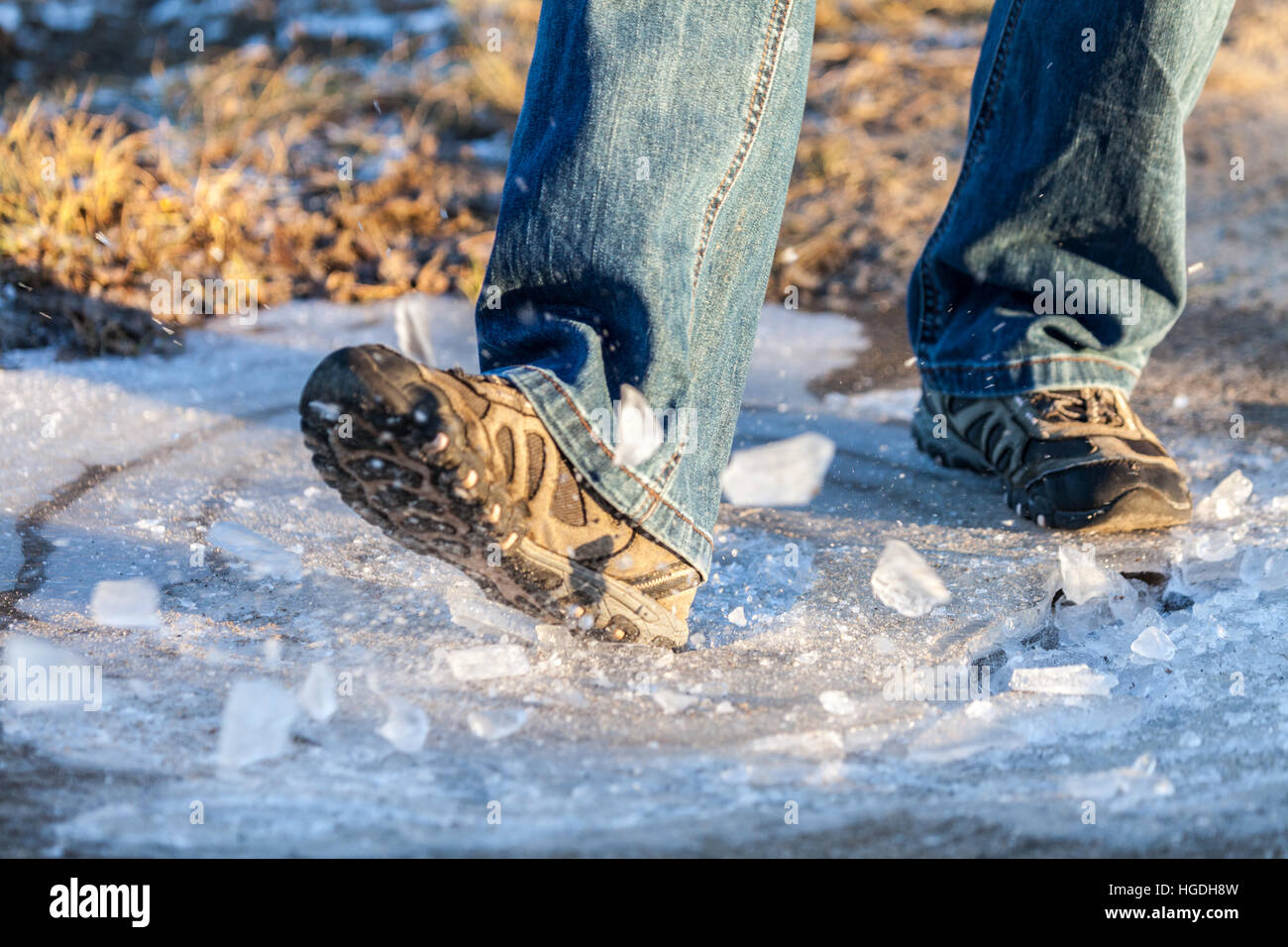 human goes on a dangerous ice area Stock Photo