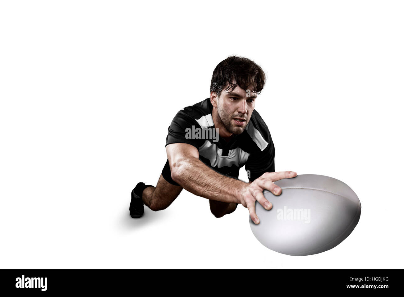 Rugby player in a Black and white uniform. White Background Stock Photo