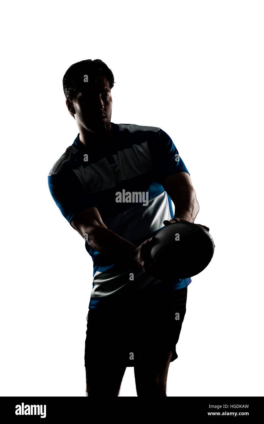 Rugby player in a blue uniform. White Background Stock Photo